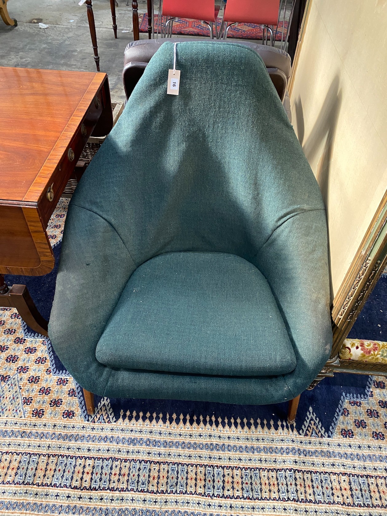 A Lurashell glass fibre lounge chair, diameter 88cm, depth 90cm, height 92cm